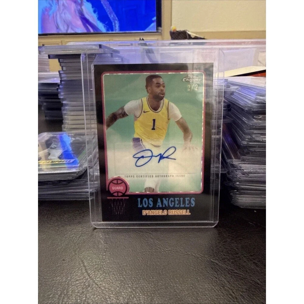 D’Angelo Russell 2024-25 Topps Chrome 1973 Topps Black Parallel Auto 2/2